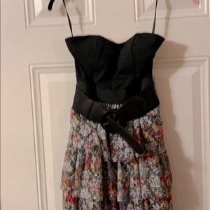 Strapless dress. Black top  Floral tiered skirt